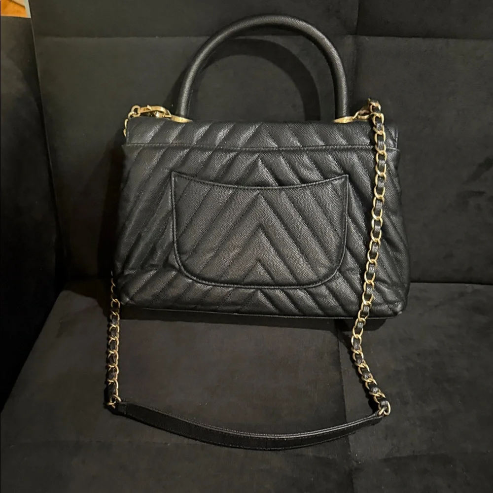 Chanel Black it only has those little marks.